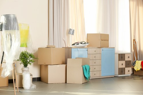 Office removals team preparing business equipment in Streatham