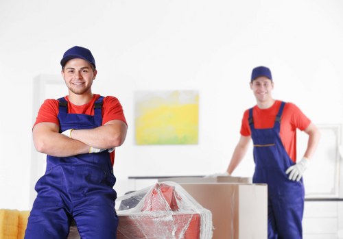 Man and van removal service preparing to load furniture in Streatham