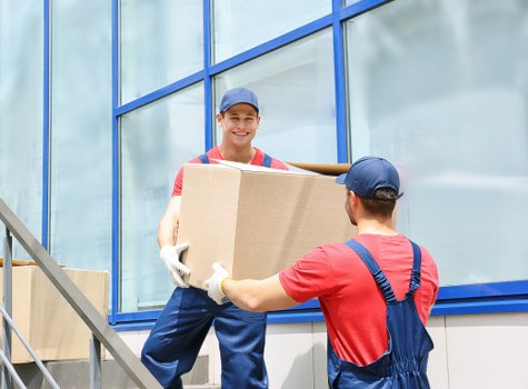 Removal van and moving team in a Streatham residential street