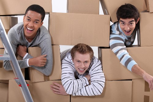 Moving team planning a house move on a Streatham residential street