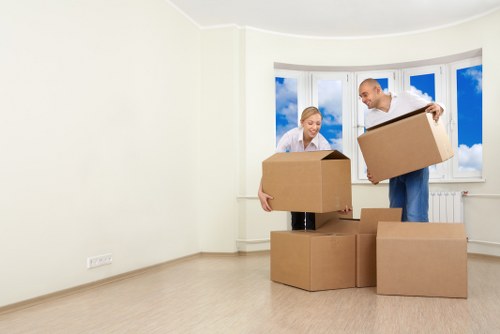 Furniture being carried through a Streatham property staircase