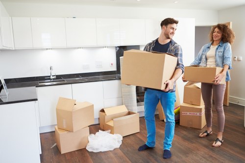 Professional movers loading household items for a Streatham relocation