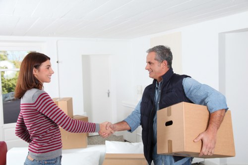 Packed boxes and furniture ready for a local flat move in Streatham