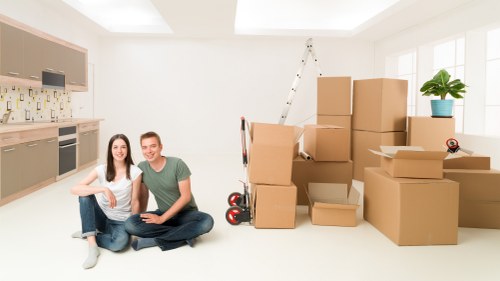 Boxes and household items being moved by a Streatham removal helper