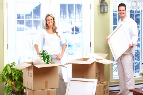 Packed boxes and furniture ready for a local home removal in Streatham