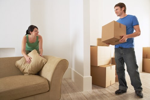 Moving team loading furniture and boxes for a Streatham home removal